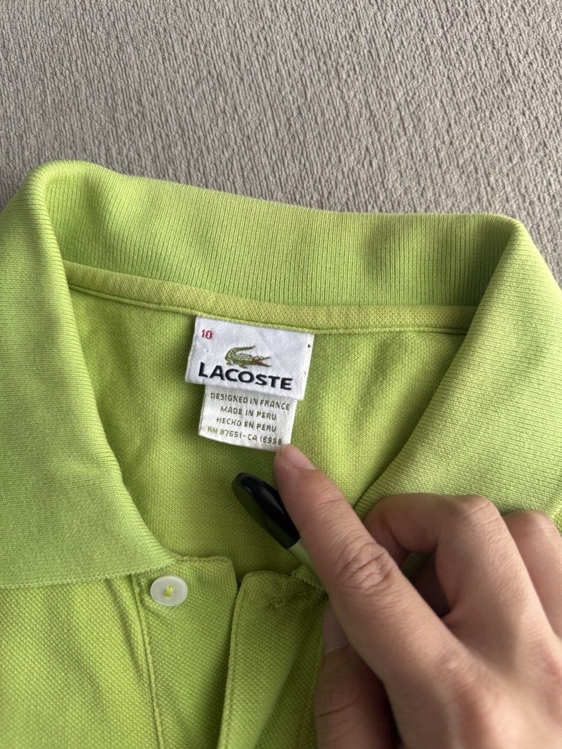 Lacoste Polo Shirt (Category: Tshirts & Polo Shirts ) located in Quezon City. Submitted by bigrackzzz (Listing ID 1461639869, Image 2). Description: - Classic lime green Lacoste polo shirt - Iconic crocodile logo on chest - Made in Peru - Simple and comfortable design - Great for casual wear - Altered 22x28.