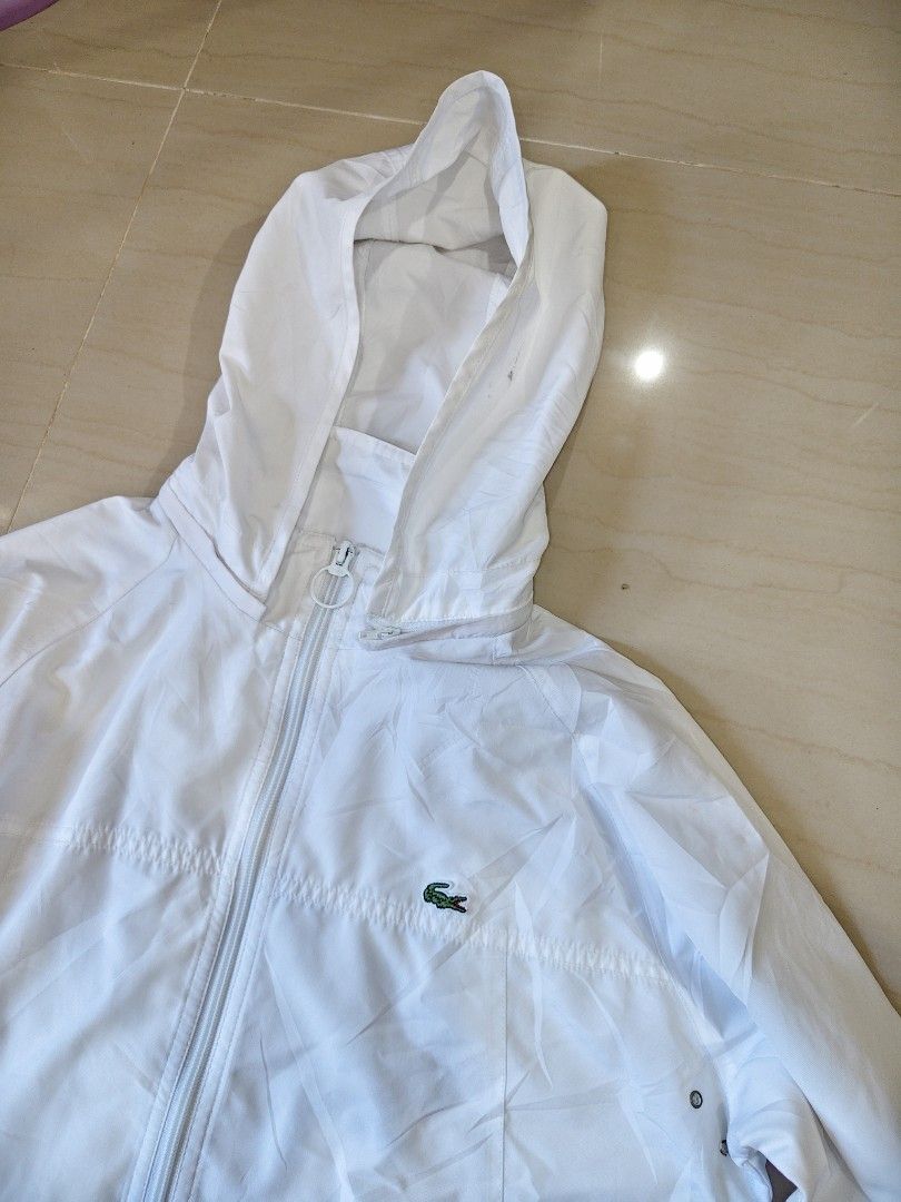 Lacoste Sport Windbreaker Size 40 (Category: Coats, Jackets and Outerwear) located in Iloilo. Submitted by branded-boy0422_16 (Listing ID 1461598552, Image 2). Description: W: 19-20 L: 25/26 Excellent to as new issue: Last picture stain kayo na mag diskarte, Solid pa condition.