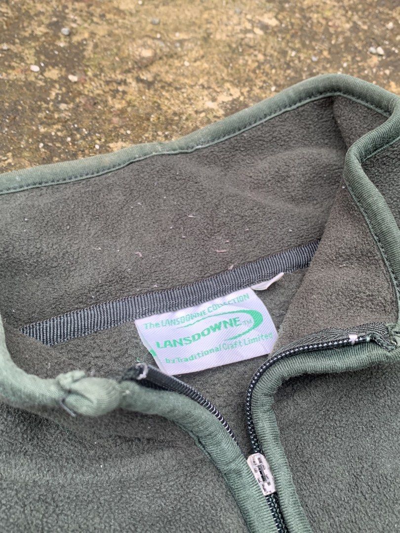 Lansdowne Ireland Fleece Jacket (Category: Coats, Jackets and Outerwear) located in Baguio. Submitted by jasthrift_ (Listing ID 1461647460, Image 2). Description: - Dark green Lansdowne fleece jacket - Features embroidered Ireland crest and logo - Full zip front - Comfortable and warm material - Great for layering - Perfect for casual wear or outdoor activities - Issue Broken Zipper .