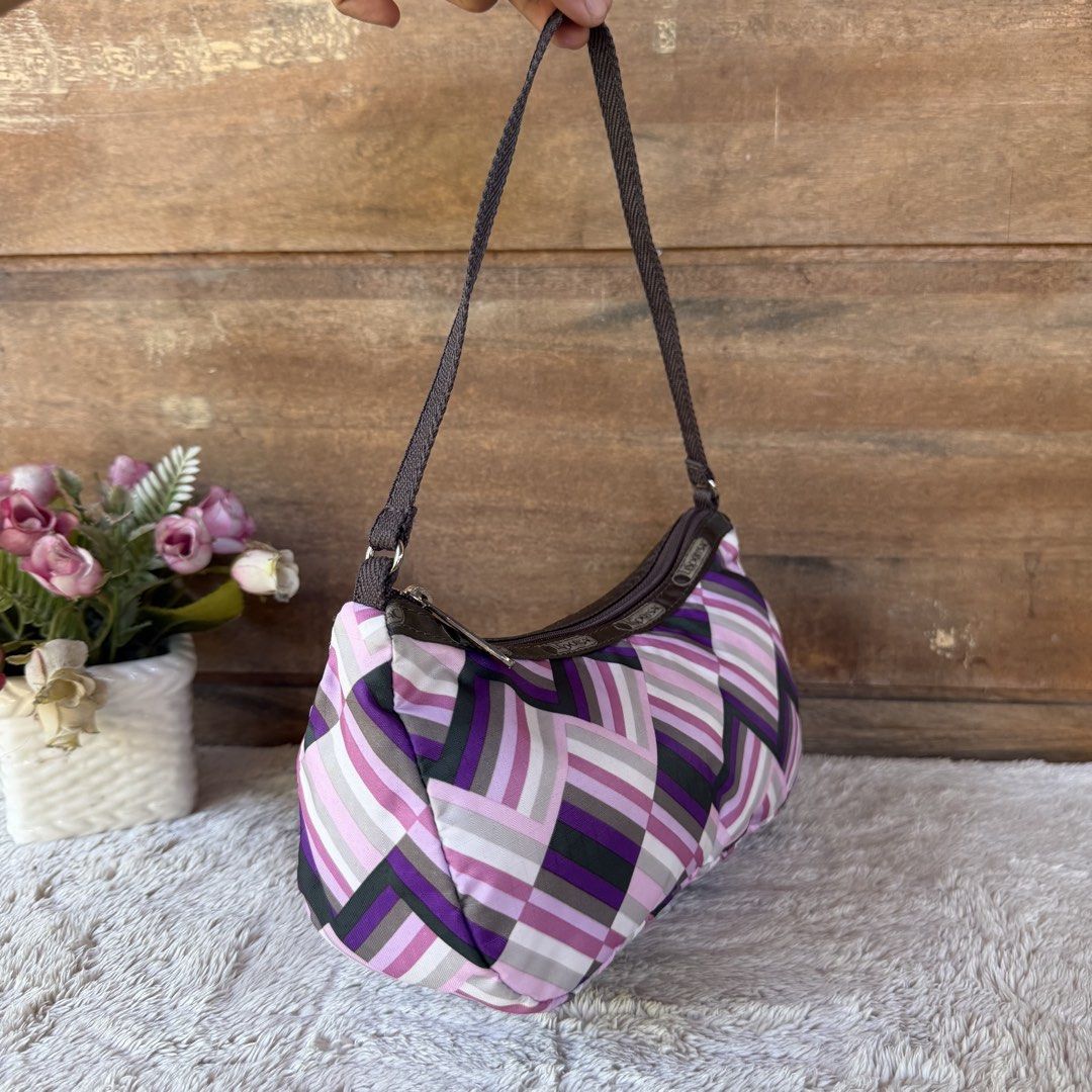 LeSportsac Nylon Mini Kili Bag (Category: Shoulder Bags) located in Tarlac. Submitted by alta.mayo (Listing ID 1461760976, Image 2). Description: • Nylon • 9.5 x 5 x 3.5 inches Guaranteed 💯% Authentic ❎ No Reservation 📌 Mop: Gcash 📌 Courier: JNT 📌 Location: Tarlac.