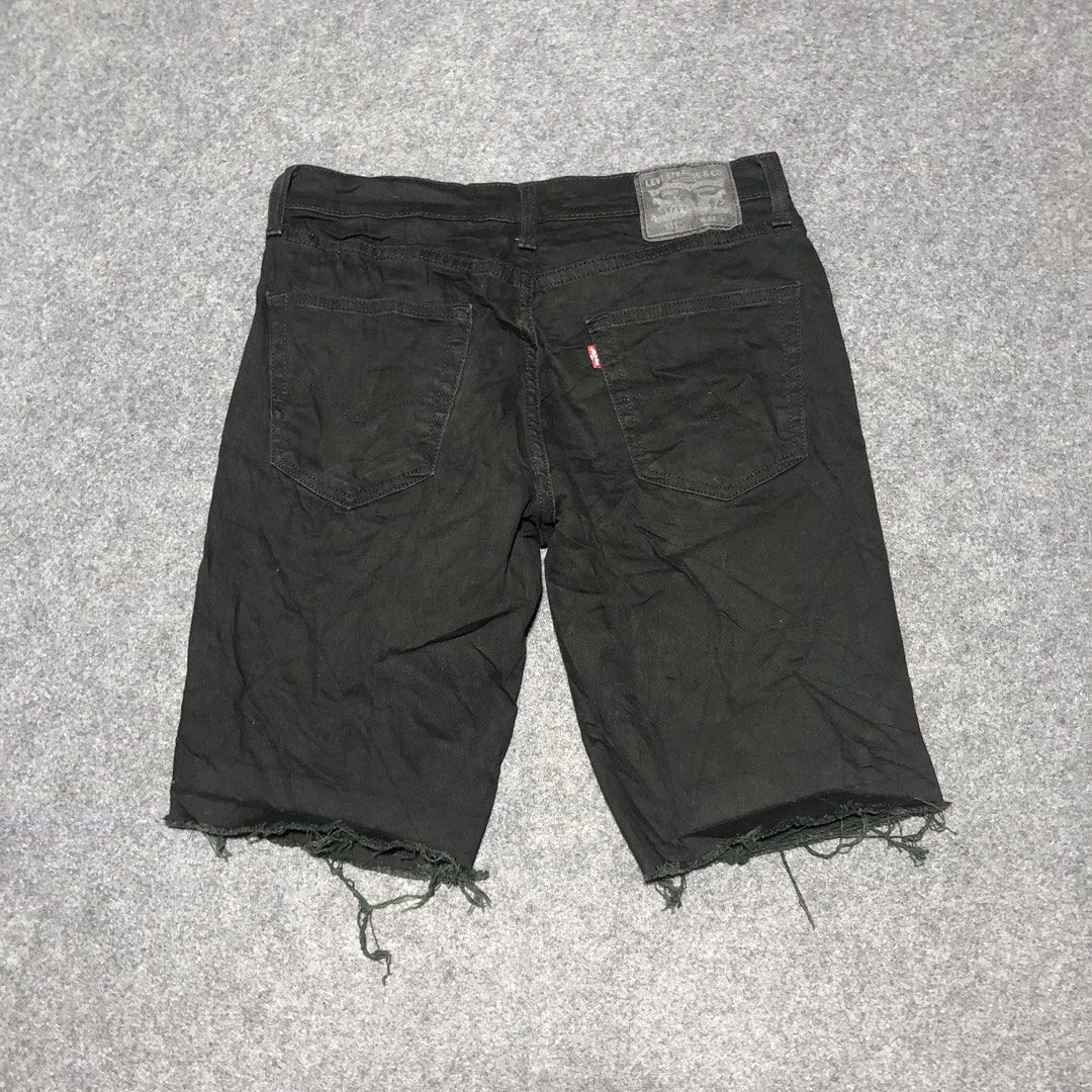 Levi's 511 Black Cut-Off Denim Shorts (Category: Jeans) located in Cebu City. Submitted by andrewvivar29 (Listing ID 1461690087, Image 3). Description: - Brand: Levi's - Model: 511 Shorts - Color: Black - Size: 32 Waist - Style: Cut-off hem for a raw, distressed look - Features: Classic five-pocket styling, button and zip fly - Occasion: Great for casual wear.