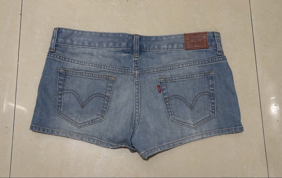 Levi's Denim Shorts Size 30 (Category: Shorts) located in Manila. Submitted by van390867 (Listing ID 1461605687, Image 2). Description: - Classic blue denim shorts by Levi's - Features iconic red tab and leather patch - Button fly closure - Size: 30 - Versatile for casual outfits.