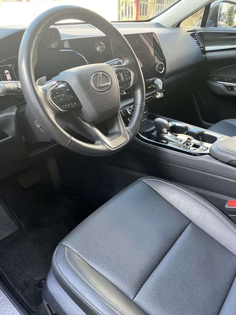 Lexus NX350H Hybrid Auto (Category: Used Cars) located in Makati City. Submitted by carguysunlimited (Listing ID 1461578013, Image 3). Description: In brand new condition. 9k kms only, NX350H hybrid executive edition. Original paint. Coding exempt. Drive and go. Makati area for viewing. Call or text 0917-3041670.