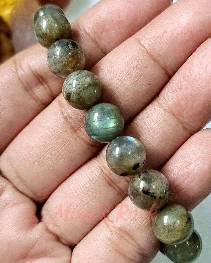 LIGHT GRADE LABRADORITE NATURAL STONE BRACELET (Category: Bracelets) located in Taguig. Submitted by mimisrack (Listing ID 1461641179, Image 2). Description: 🩶A subtle guardian charm for intuition, protection, and gentle strength." -Labradorite helps shield against negative energy and emotional drain -Enhances intuition, awareness, and inner guidance -Supports calm focus and mental clarity -Light grade stones give a soft, natural shimmer -A mean