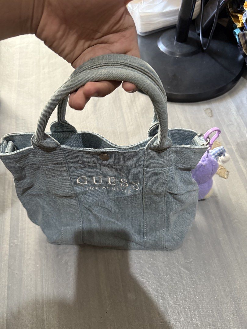 Light wash denim Guess tote bag (Category: Tote Bags) located in Cagayan de Oro. Submitted by twice.but.nice.blackmarket (Listing ID 1461639290, Image 3). Description: Excellent condition Height 10 Width 13.