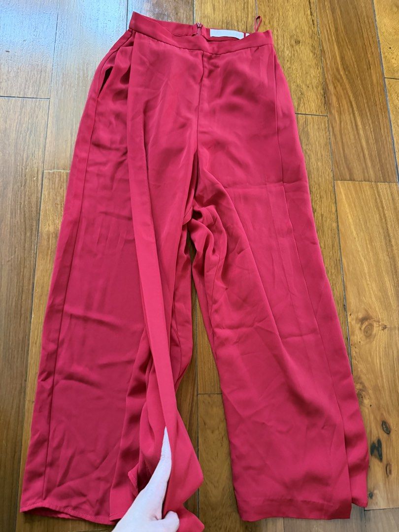 Like new Keepsake cherry red trousers bottoms XS (Category: Other Bottoms) located in Quezon City. Submitted by closet.cha (Listing ID 1461679088, Image 3). Description: Keepsake (Australian brand) Color of pants is red/cherry red Pockets on both sides, has slit (?) design at the front Fits xs 24-25” waist, 36” hips No return no exchange No haggle and low baller offers. No other photos or when worn for flat lays. No Meet-Ups No Cash on Delivery N