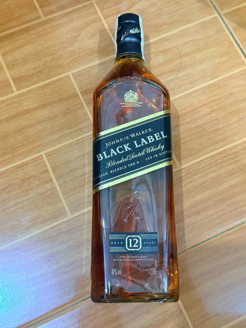 LIQUOR COLLECTION- ALL IN (Category: Beverages) located in Bulacan. Submitted by bottlecollector2027 (Listing ID 1461591376, Image 3). Description: - Assorted liquor collection featuring premium brands. - Includes Johnnie Walker Blue Label (Limited Edition 2017 Year of the Rooster). - Also includes Johnnie Walker Black Label 12 Years. - A bottle of Bordeaux red wine is part of the collection..