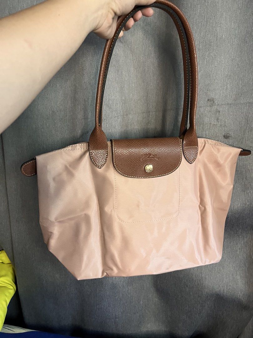 Longchamp Ltea Pink (Category: Tote Bags) located in San Jacinto. Submitted by kellysthrift_ (Listing ID 1461589489, Image 1). Description: Ltea pink long handle Longchamp.