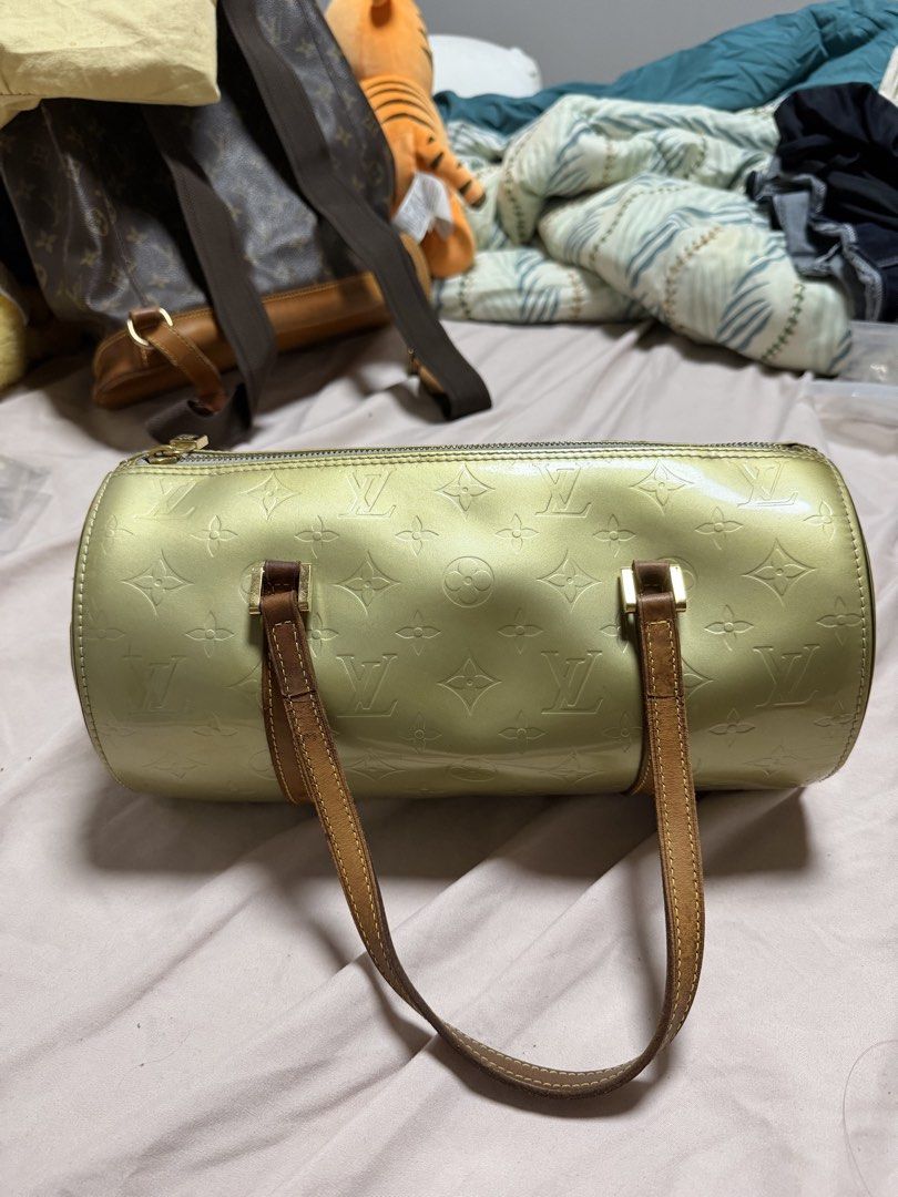 Louis Vuitton Bedford Bag - Green (Category: Luxury Bags & Wallets) located in Angeles City. Submitted by lecsdeclutter (Listing ID 1461721260, Image 1). Description: Price is negotiable Thrifted from Qatar (orig price: ₱20,000) Original LV Exterior: Gold Hardware Zippers & stitches all in good condition Visible scratches & Discoloration Side pocket in tact Leather straps: slightly weathered Interior: Inner lining peeling No major damages.