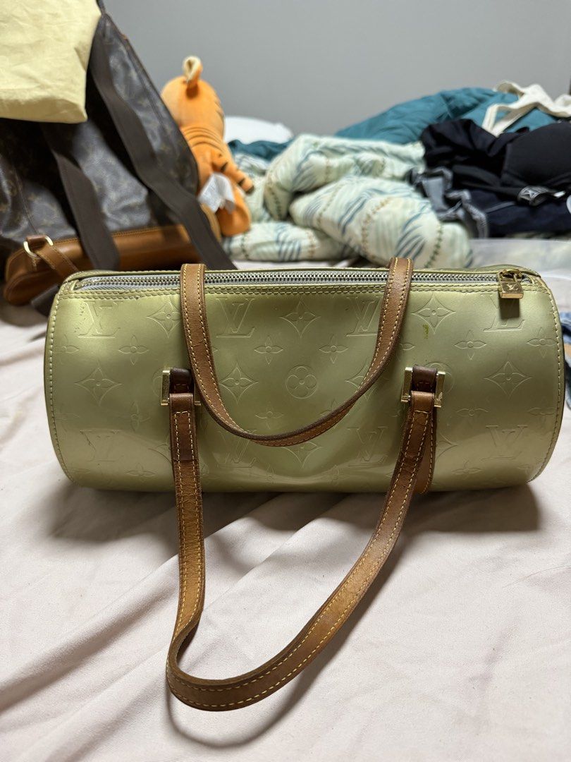 Louis Vuitton Bedford Bag - Green (Category: Luxury Bags & Wallets) located in Angeles City. Submitted by lecsdeclutter (Listing ID 1461721260, Image 2). Description: Price is negotiable Thrifted from Qatar (orig price: ₱20,000) Original LV Exterior: Gold Hardware Zippers & stitches all in good condition Visible scratches & Discoloration Side pocket in tact Leather straps: slightly weathered Interior: Inner lining peeling No major damages.