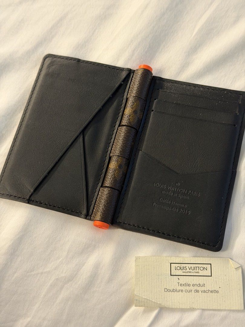Louis Vuitton Pocket Organizer by Virgil Abloh (Category: Luxury Bags & Wallets) located in Makati City. Submitted by arkera.274 (Listing ID 1461563261, Image 2). Description: - Authentic Louis Vuitton Card Holder - Classic Monogram Canvas Exterior - Black Leather Interior with Card Slots - Made in Spain - From the Défilé Homme Collection (Spring-Summer 2019) No box but in great condition - Comes with Authenticity Card.