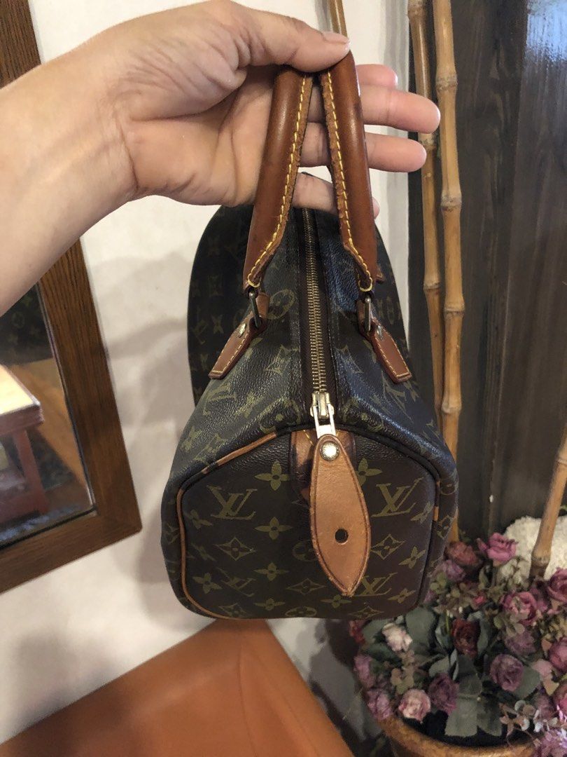 Louis Vuitton Speedy Monogram Canvas Handbag (Category: Luxury Bags & Wallets) located in Quezon City. Submitted by yunajohan24 (Listing ID 1461700956, Image 2). Description: - Classic Louis Vuitton Speedy bag - Monogram canvas with vachetta leather trim - Zipper closure - Interior date code: SP1016 - Handles and trim show patina - Timeless piece for your collection.