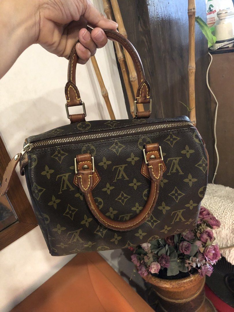 Louis Vuitton Speedy Monogram Canvas Handbag (Category: Luxury Bags & Wallets) located in Quezon City. Submitted by yunajohan24 (Listing ID 1461700956, Image 3). Description: - Classic Louis Vuitton Speedy bag - Monogram canvas with vachetta leather trim - Zipper closure - Interior date code: SP1016 - Handles and trim show patina - Timeless piece for your collection.