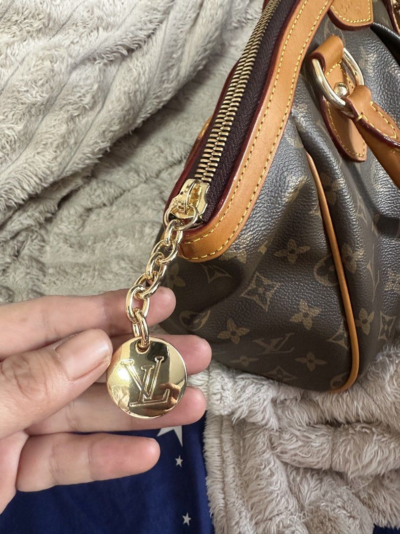 Louis Vuitton Tivoli PM handbag (Category: Luxury Bags & Wallets) located in Cebu City. Submitted by forless.ph (Listing ID 1461747829, Image 2). Description: - Iconic monogram canvas - Rolled leather handles - Gold-tone hardware - Spacious interior for essentials - Timeless and versatile design - Ideal for everyday use or travel.
