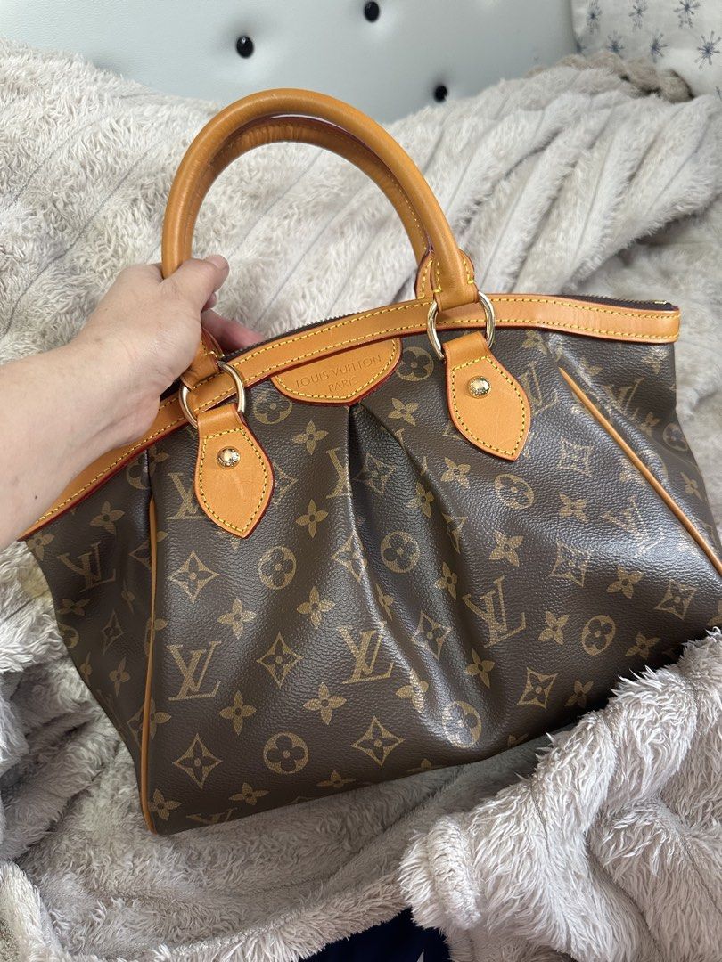 Louis Vuitton Tivoli PM handbag (Category: Luxury Bags & Wallets) located in Cebu City. Submitted by forless.ph (Listing ID 1461747829, Image 1). Description: - Iconic monogram canvas - Rolled leather handles - Gold-tone hardware - Spacious interior for essentials - Timeless and versatile design - Ideal for everyday use or travel.