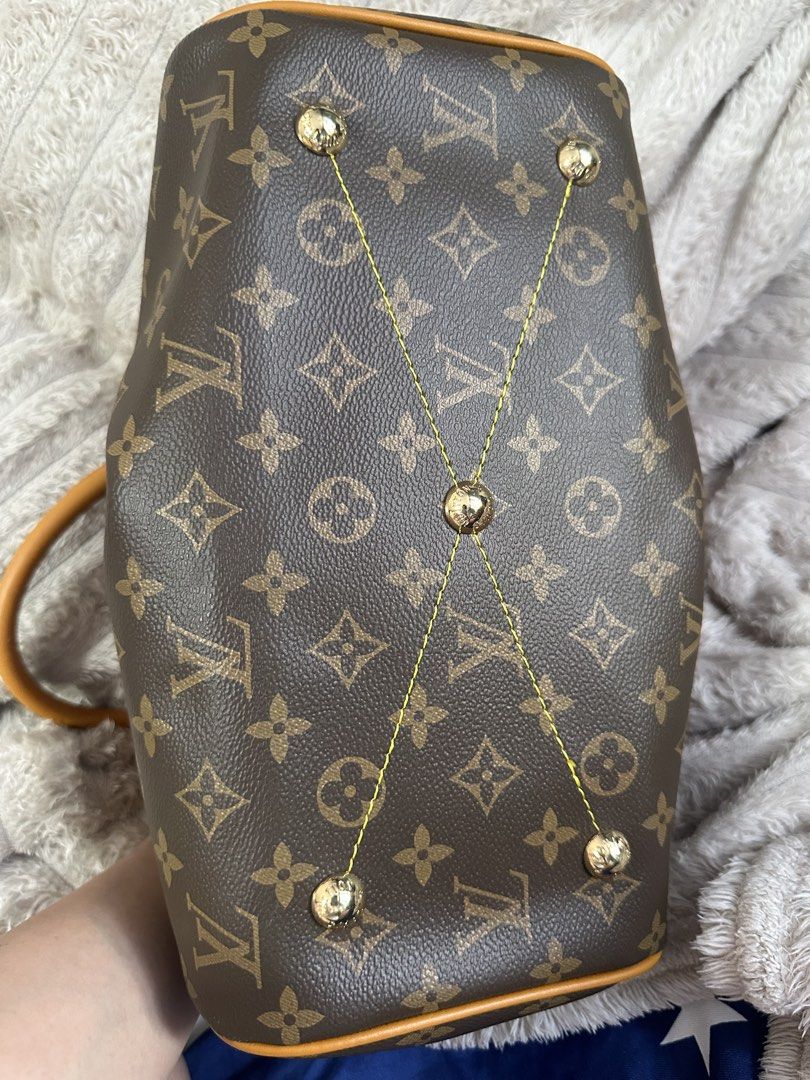 Louis Vuitton Tivoli PM handbag (Category: Luxury Bags & Wallets) located in Cebu City. Submitted by forless.ph (Listing ID 1461747829, Image 3). Description: - Iconic monogram canvas - Rolled leather handles - Gold-tone hardware - Spacious interior for essentials - Timeless and versatile design - Ideal for everyday use or travel.