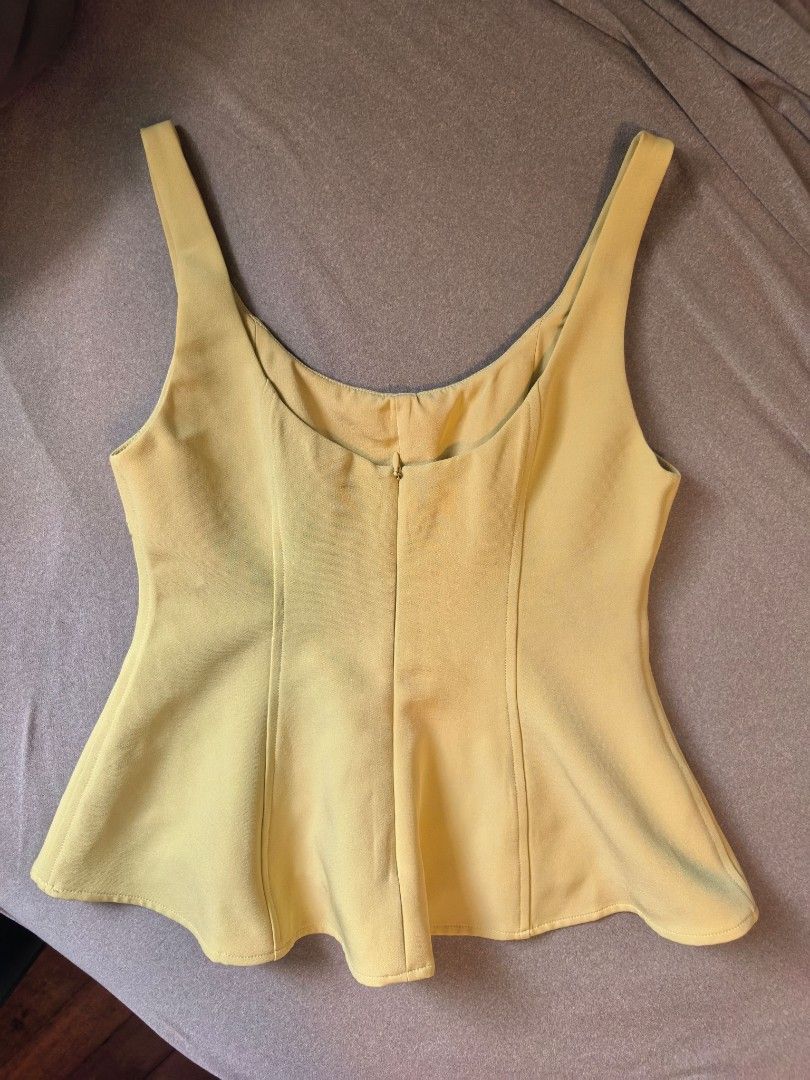 Love Bonito Peplum Top (Category: Sleeveless) located in Manila. Submitted by wonderandtravel (Listing ID 1461707419, Image 2). Description: xs on tag worn few times only, in very good condition bought for 2k++ RFS - decluttering 😊.