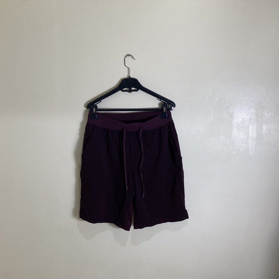 Lululemon Burgundy Athletic Shorts Size M (Category: Activewear) located in Manila. Submitted by carbertjakosalem (Listing ID 1461780542, Image 1). Description: - Burgundy Lululemon athletic shorts - Size: Medium (M) - Elastic waistband with adjustable drawstring - Convenient zippered pocket on the back - Lightweight and breathable material - Ideal for running, workouts, and other athletic activities.