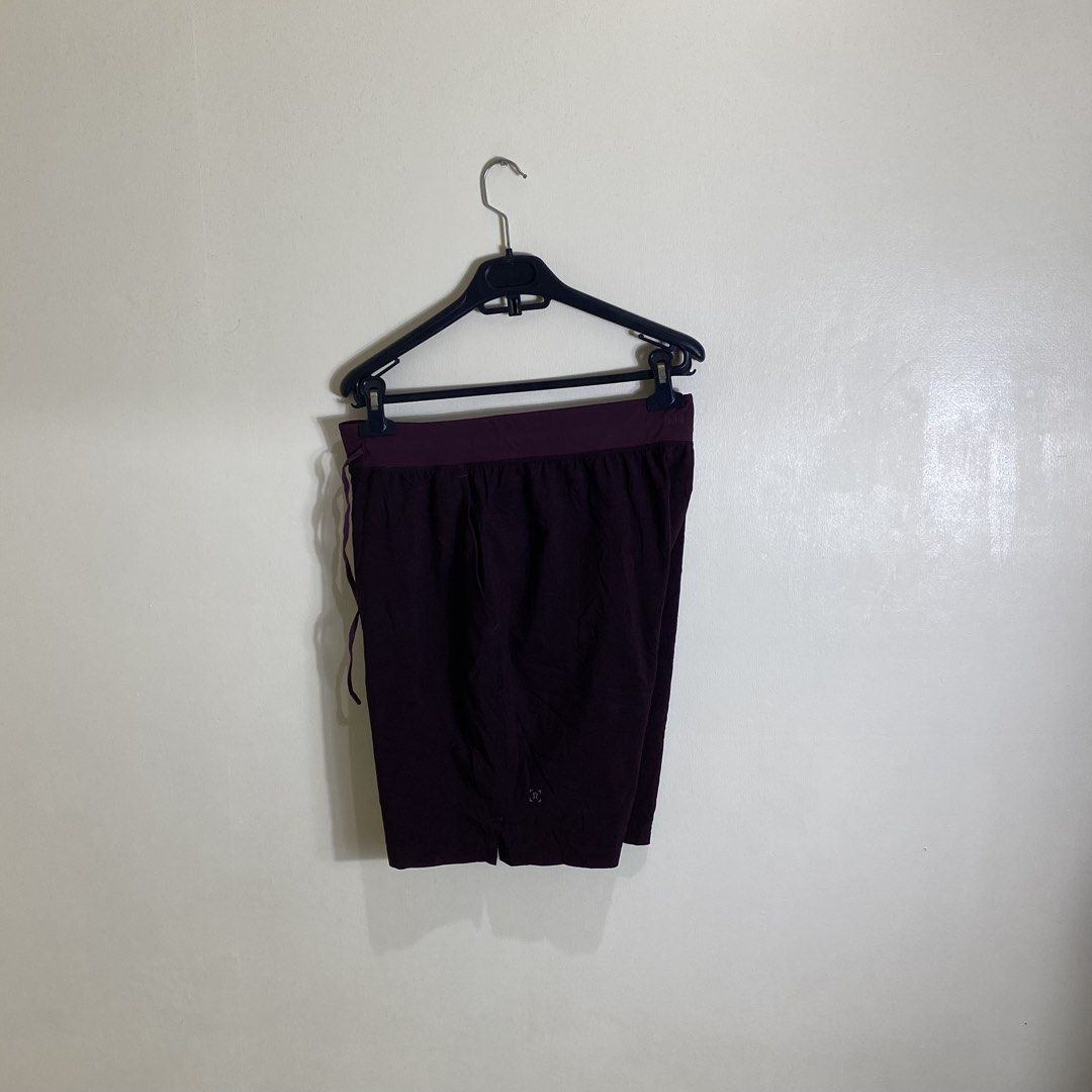 Lululemon Burgundy Athletic Shorts Size M (Category: Shorts) located in Cebu City. Submitted by theloose.thread (Listing ID 1461781470, Image 2). Description: - Burgundy Lululemon athletic shorts - Size: Medium (M) - Elastic waistband with adjustable drawstring - Convenient zippered pocket on the back - Lightweight and breathable material - Ideal for running, workouts, and other athletic activities.