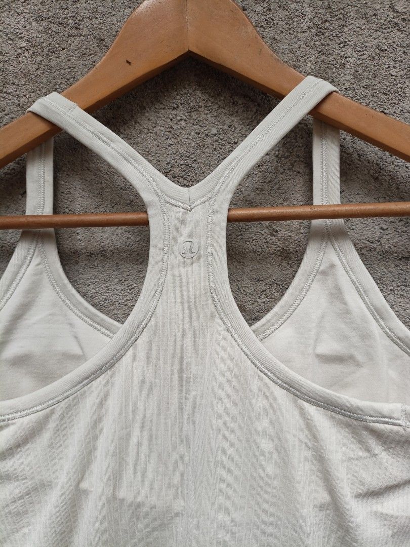 Lululemon Ribbed Racerback Tank Top Cream (Category: Sleeveless) located in Maasim. Submitted by ukayganda25 (Listing ID 1461796964, Image 3). Description: - Lululemon cream ribbed tank top - Racerback style - Subtle logo detail on the back - Comfortable and stretchy material - Perfect for workouts or casual outfits - Pairs well with shorts or leggings.