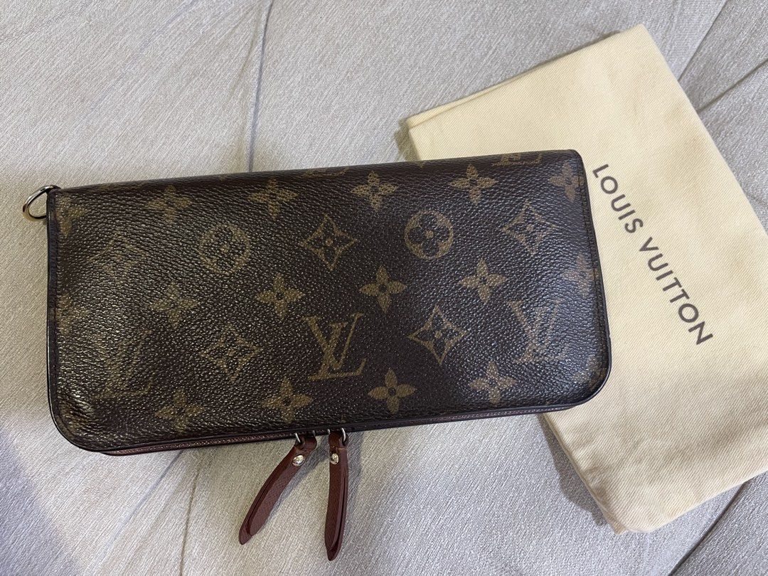 LV Insolite Wallet with Entrupy (Category: Luxury Bags & Wallets) located in Manila. Submitted by sa.edit (Listing ID 1461628157, Image 2). Description: LV Monogram Insolite Wallet Made in Spain Material: Monogram coated canvas, cross-grain leather lining Color: Classic brown interior, gold-tone hardware Inclusions: dustbag, entrupy certificate Measurements: 8.4” L x 4.25” H Excellent condition. Barely noticeable hot-stamped initials. Clean inter