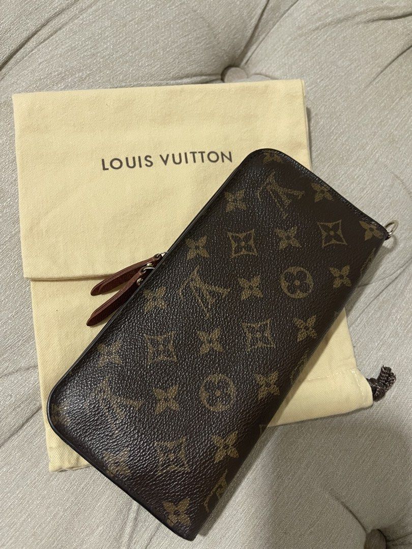 LV Insolite Wallet with Entrupy (Category: Luxury Bags & Wallets) located in Manila. Submitted by sa.edit (Listing ID 1461628157, Image 1). Description: LV Monogram Insolite Wallet Made in Spain Material: Monogram coated canvas, cross-grain leather lining Color: Classic brown interior, gold-tone hardware Inclusions: dustbag, entrupy certificate Measurements: 8.4” L x 4.25” H Excellent condition. Barely noticeable hot-stamped initials. Clean inter
