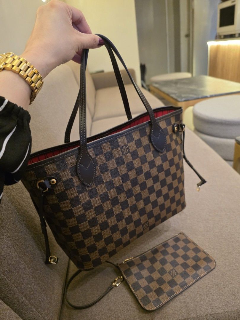 Preloved Louis Vuitton Neverfull Ebene Damier PM Size bag (Category: Luxury Bags & Wallets) located in Antipolo. Submitted by aaliyahs.closet2 (Listing ID 1461589195, Image 2). Description: ALL MUST GO. DECLUTTERING MY PERSONAL BAGS. From Japan Thrift Shop. Self- Authentication. Strictly 2days Reservation Only. Sending Offer means, you are decided to purchase the item. After Offer is ACCEPTED it is automatically Reserved. No returns, no exchanged
