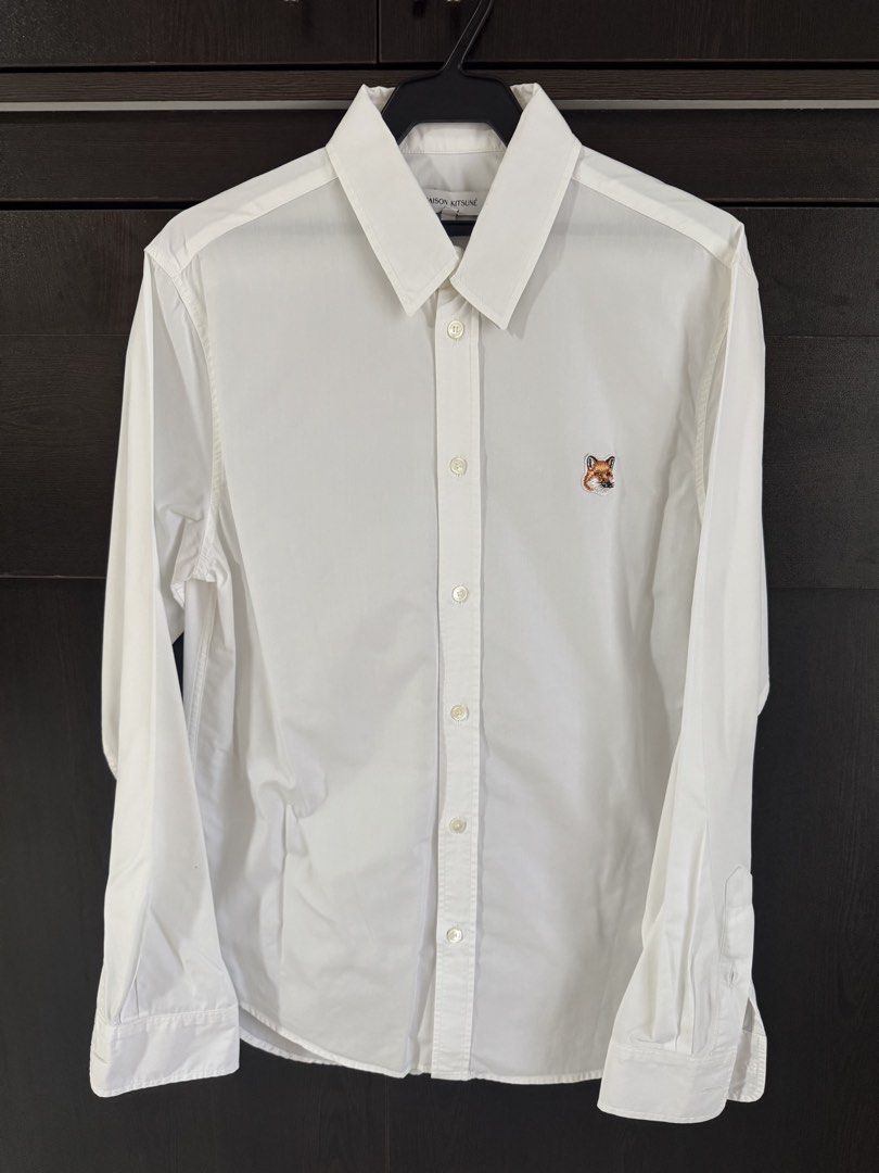 Maison Kitsuné White Long Sleeve Polo (Category: Formal Shirts) located in Pasay City. Submitted by josec03 (Listing ID 1461617793, Image 1). Description: Barely used and well maintained Madison Kitsuné Long Sleeve Shirt. Still pristine white. .