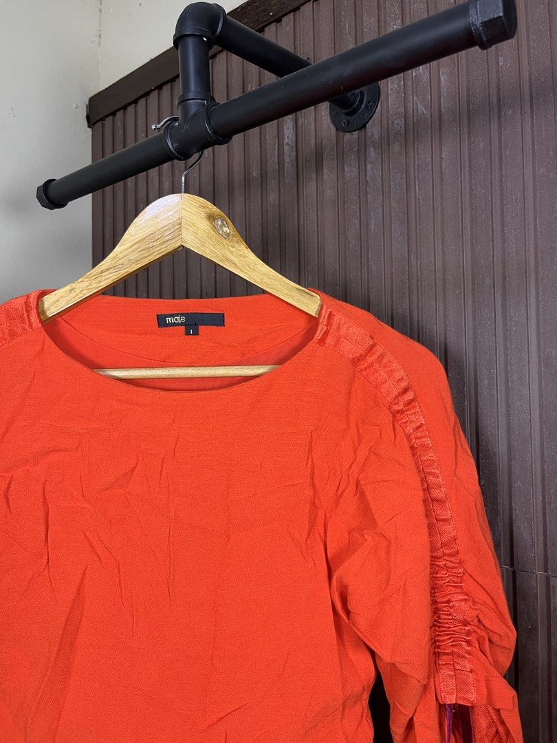 Maje Ruffled Midi Dress (Category: Dresses) located in Cabanatuan. Submitted by cabsygoods (Listing ID 1461707393, Image 2). Description: Maje Ruffled Midi Dress Width 18 Length 35 Very good condition No issue Color rate 9/10 Dm to purchase! 📩.