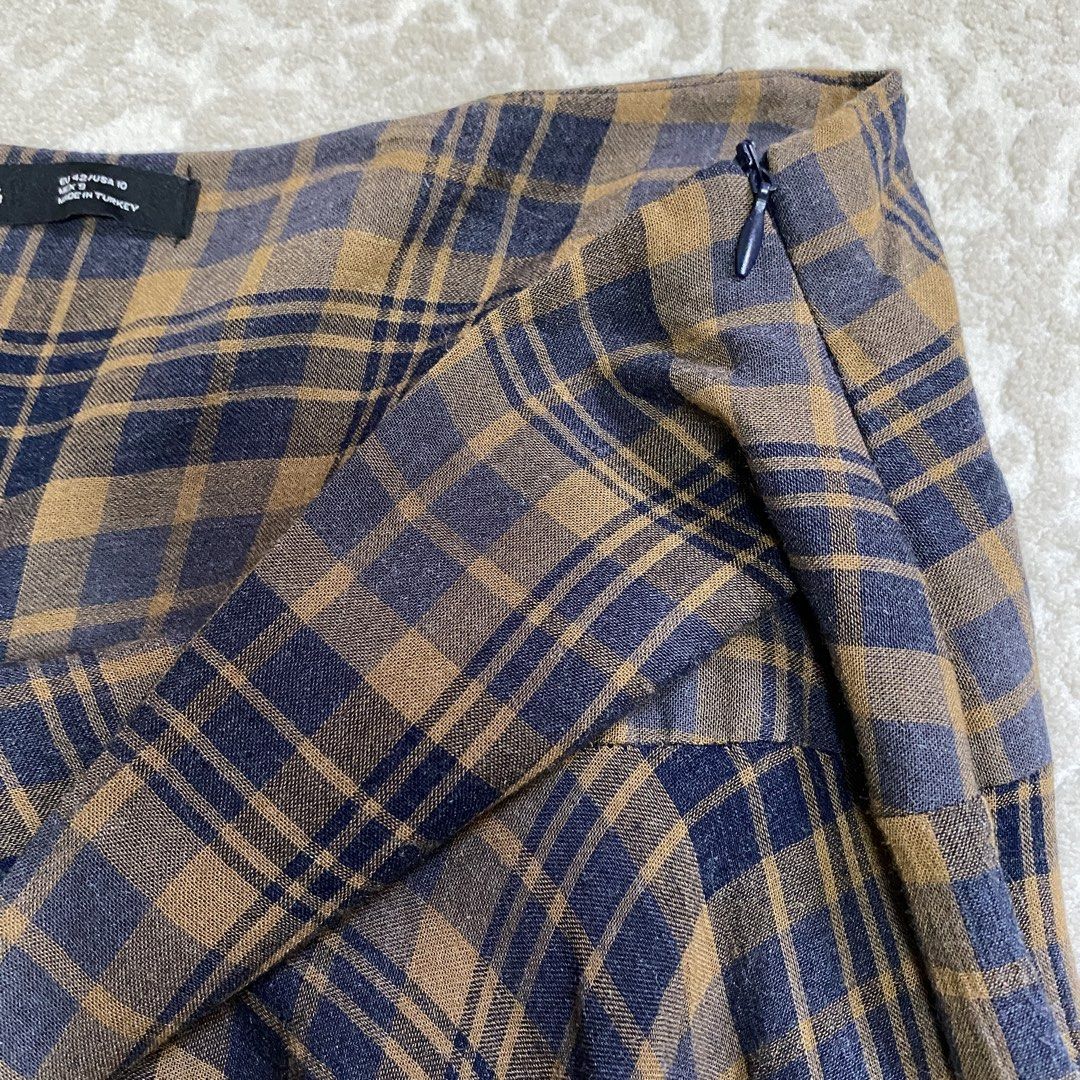 Mango asymmetrical skirt (Category: Skirts) located in Mandaluyong City. Submitted by tinytrinket (Listing ID 1461616940, Image 3). Description: - mango size eu 42 / us 10 - asymmetrical midi length - plaid fabric .