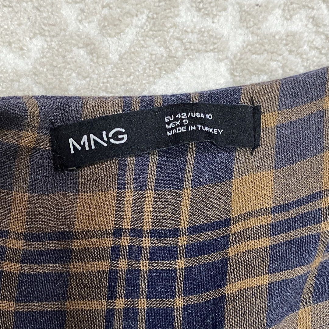 Mango asymmetrical skirt (Category: Skirts) located in Mandaluyong City. Submitted by tinytrinket (Listing ID 1461616940, Image 2). Description: - mango size eu 42 / us 10 - asymmetrical midi length - plaid fabric .