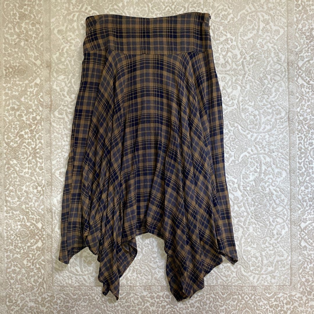 Mango asymmetrical skirt (Category: Skirts) located in Mandaluyong City. Submitted by tinytrinket (Listing ID 1461616940, Image 1). Description: - mango size eu 42 / us 10 - asymmetrical midi length - plaid fabric .