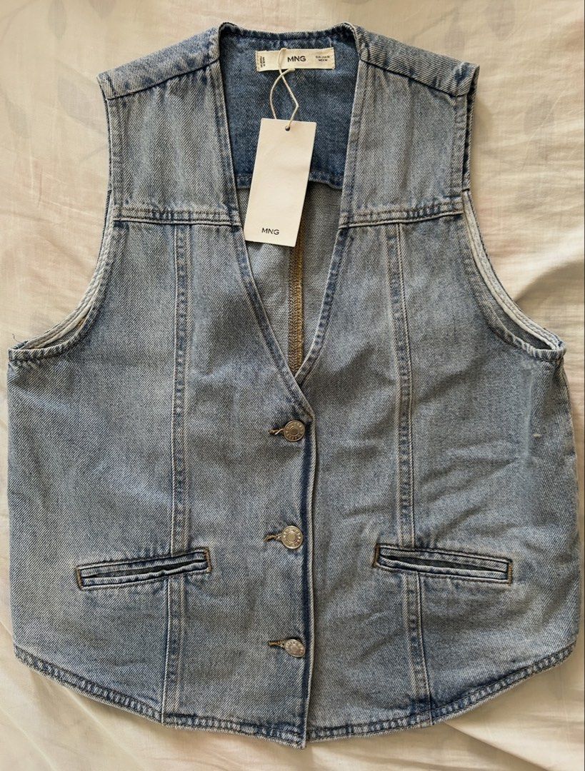 Mango Denim Vest With Seams - Size S (Category: Sleeveless) located in Cebu City. Submitted by lovedbymomandiana (Listing ID 1461726092, Image 1). Description: - Mango light wash denim vest - Size S - V-neck design - Button-up front closure - Two functional front pockets - Versatile for layering over tees or dresses - Adds a casual vibe to any outfit.