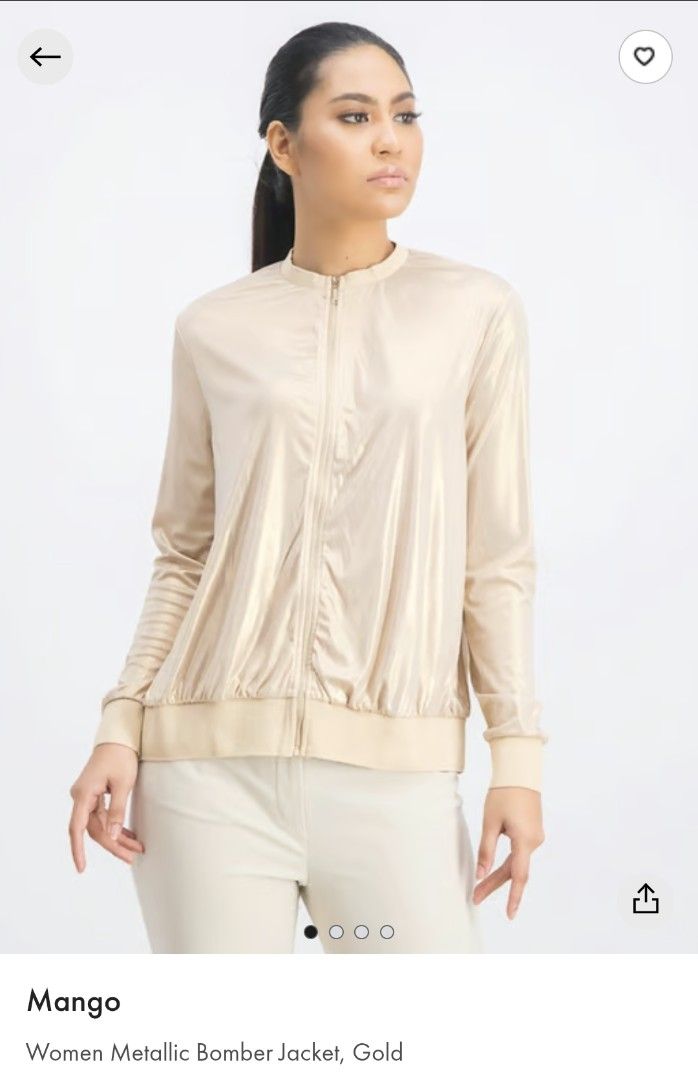 Mango Women's Light Gold Metallic Bomber Jacket (Category: Coats, Jackets and Outerwear) located in Quezon City. Submitted by gbabesy2.0 (Listing ID 1461617436, Image 1). Description: - Gold metallic bomber jacket from Mango - Still with tag (pwede pang gift) - Zip-up front with a stand collar - Elasticated cuffs and hem - Lightweight material, ideal for layering - Adds a chic shine to any outfit.