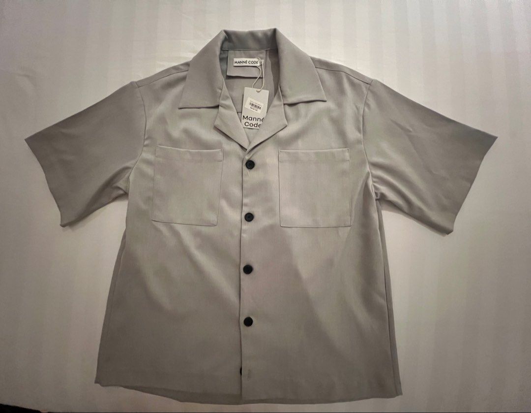 Manne Code (Category: Tshirts & Polo Shirts ) located in Quezon City. Submitted by inthefrow (Listing ID 1461678378, Image 1). Description: - Brand new with tags - Purchased in Vietnam - Price indicated is equivalent to P1,560 so get this at a steal! - Comes with Manne Code shopping bag • Best price already .