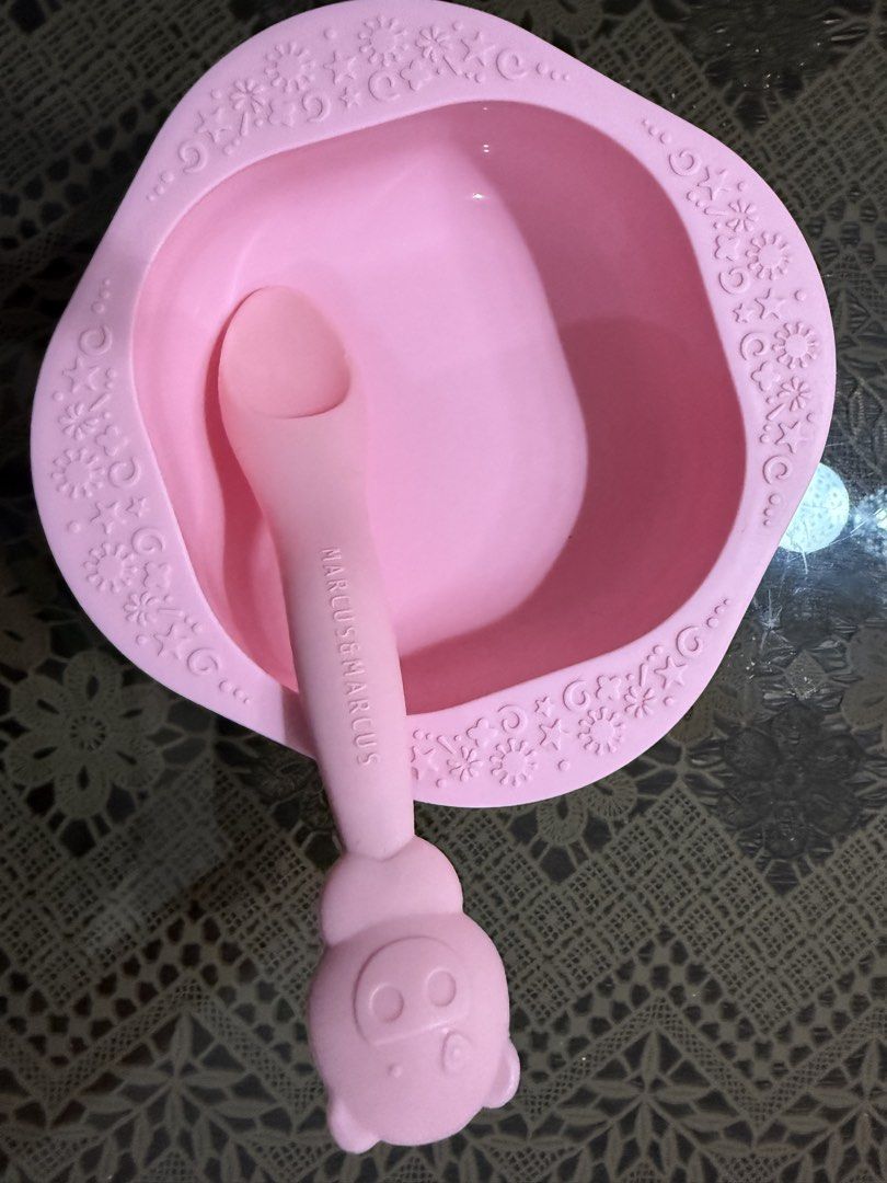 Marcus & Marcus Pink Baby Bowl and Spoon Set (Category: Weaning & Toddler Feeding) located in Paranaque City. Submitted by bratty.20 (Listing ID 1461726086, Image 1). Description: - Adorable pink baby bowl and spoon set. - Spoon features 'MARCUS&MARCUS' branding. - Bowl has a charming star and flower pattern around the rim. - Spoon handle includes a cute character design. - Ideal for making mealtime easy and fun for your little one..