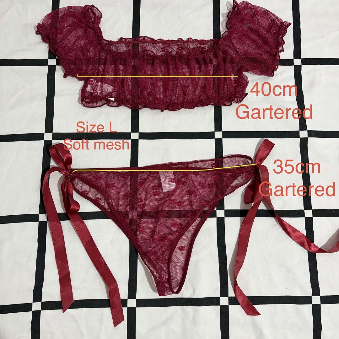 Maroon Lace Gartered Thong Lingerie (Category: Undergarments & Loungewear) located in Quezon City. Submitted by tflquezoncity (Listing ID 1461737996, Image 3). Description: ❤️Excellent condition 10/10, no issues ❤️Cute maroon lace lingerie set ❤️Size: L ❤️RFS: Wrong size ❤️Features an off-shoulder ruffled top ❤️Includes a gartered thong with ribbon ties ❤️Made of soft mesh with a floral pattern ❤️Top measurements: 40cm (gartered) ❤️Thong measurem