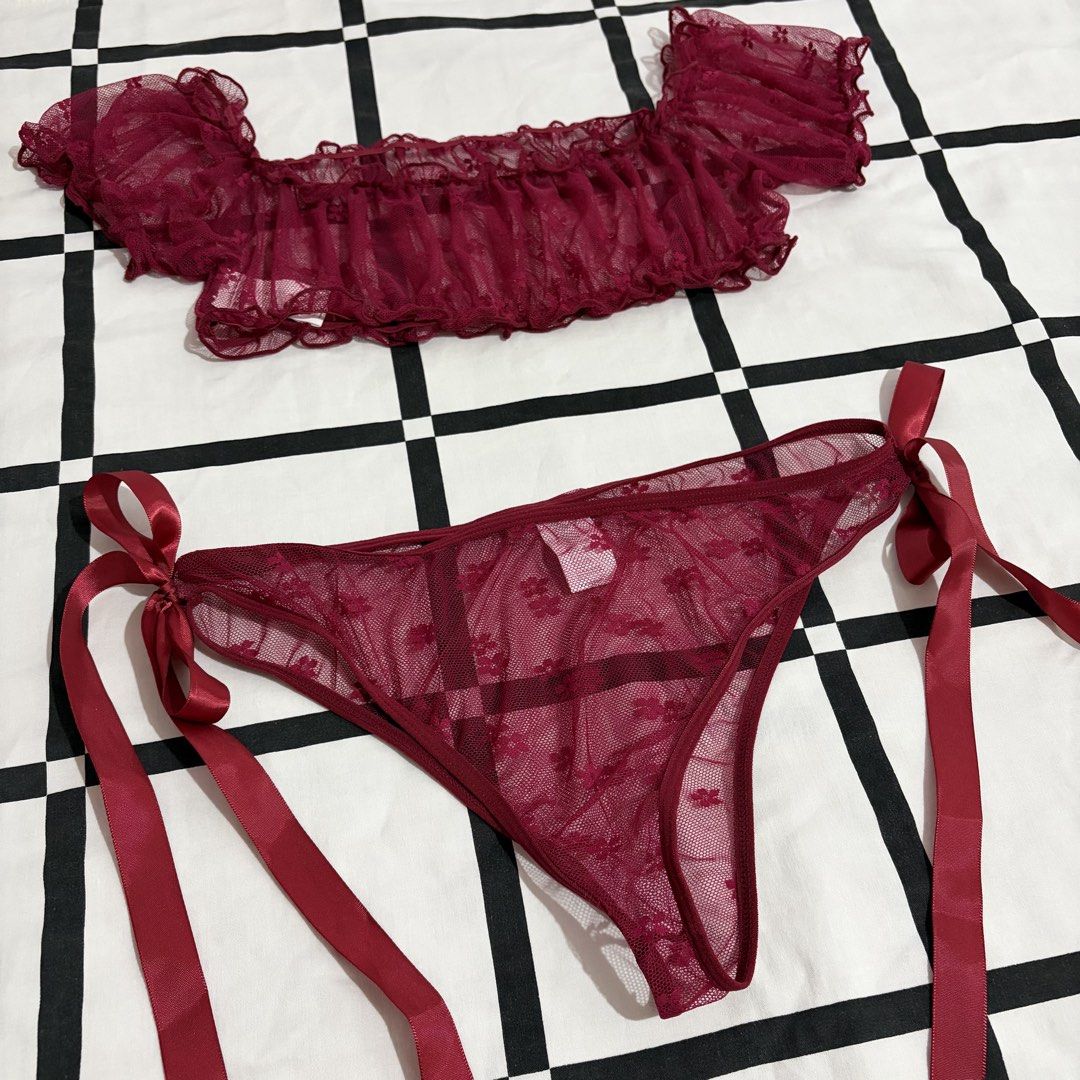 Maroon Lace Gartered Thong Lingerie (Category: Undergarments & Loungewear) located in Quezon City. Submitted by tflquezoncity (Listing ID 1461737996, Image 1). Description: ❤️Excellent condition 10/10, no issues ❤️Cute maroon lace lingerie set ❤️Size: L ❤️RFS: Wrong size ❤️Features an off-shoulder ruffled top ❤️Includes a gartered thong with ribbon ties ❤️Made of soft mesh with a floral pattern ❤️Top measurements: 40cm (gartered) ❤️Thong measurem