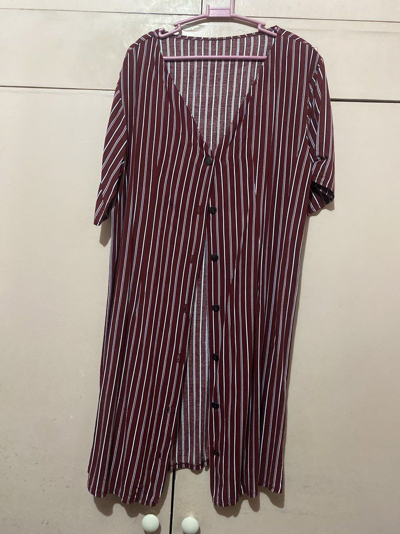 Maroon Striped Button-Up Midi Dress (Category: Dresses) located in Manila. Submitted by angelaay143 (Listing ID 1461772416, Image 1). Description: - Maroon dress with white vertical stripes - Button-up front - V-neckline - Short sleeves - Ideal for casual wear - Comfortable fabric - Easy to style - Needs laundry stored too long at the cabinet.