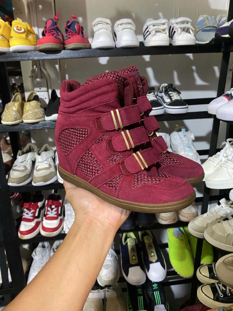 Maroon Suede Wedge Sneakers with Gold Straps (Category: Sneakers) located in Manila. Submitted by emergurl (Listing ID 1461623199, Image 1). Description: - Maroon suede wedge sneakers - Mesh detail on the sides - Three gold accent straps with velcro closure - Classic brown rubber sole - Adds height and style to your outfit - Easy to put on and take off SIZE 36 No issue.