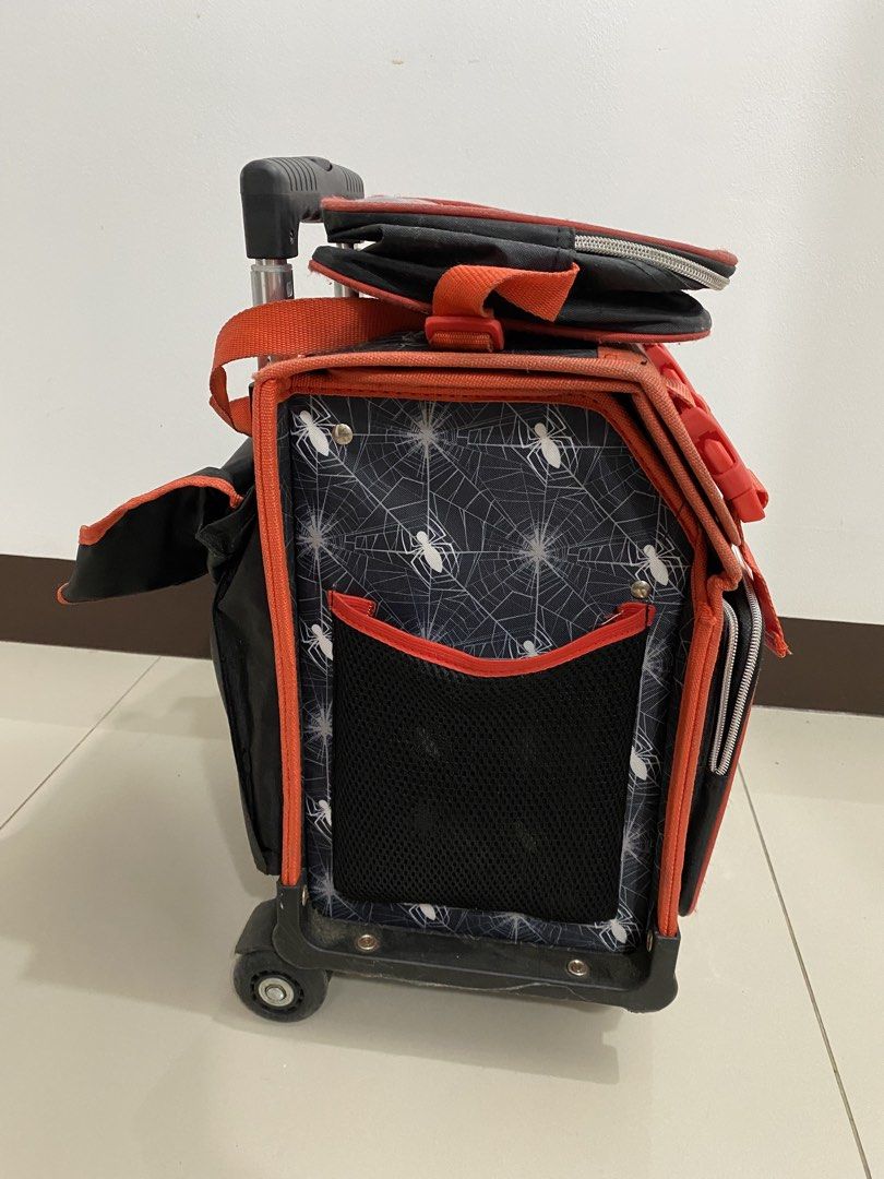 Marvel Spider Man box type school trolley bag (Category: Babies & Kids Fashion) located in Quezon City. Submitted by pbonlinestore (Listing ID 1461646196, Image 3). Description: Hindi na nagagamit, maganda pa siya. Need lang ng konting punas and linis kasi natambak lang sa bahay. Isang taon lang nagamit ng anak ko, nung grade 2 siya. Pm for more questions and pic. RFS: Decluttering & need ng pandagdag sa pambili ng table and chair ng anak ko Than