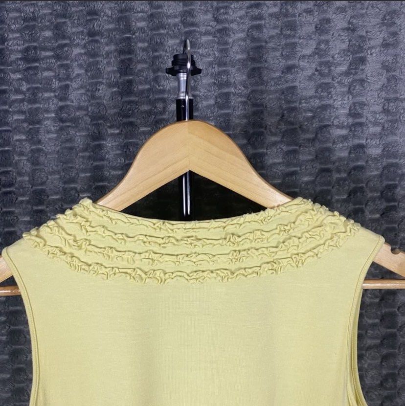 Maxmara Weekend Line Sleeveless Ruffled Top (Category: Sleeveless) located in Bacolod City. Submitted by treasurehunts.6100 (Listing ID 1461716507, Image 3). Description: Maxmara Weekend Line Sleeveless Ruffled Top Condition - Excellent Color - Pastel Yellow Color rate - 9.8 / 10 No Flaws Size Medium Dimensions : Width - 16.5 Length - 23.5 Brands you might find on my profile : ( Cos, Uniqlo, H&M, Zara, Muji, Ralph Lauren, Hugo Boss, Fred Perry, L