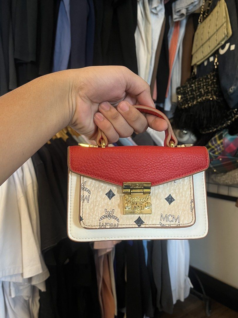 MCM small sling bag (Category: Luxury Bags & Wallets) located in General Santos City (Dadiangas). Submitted by maisonmargiela2004 (Listing ID 1461641799, Image 2). Description: .