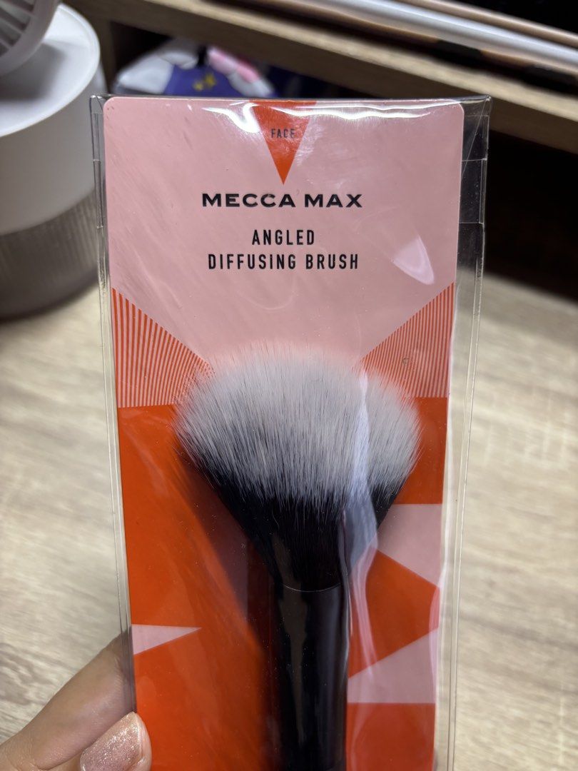 MECCA MAX Angled Diffusing Brush (Category: Makeup) located in Davao. Submitted by mielle_888 (Listing ID 1461605641, Image 2). Description: ‼️Brand new ‼️ - MECCA MAX Angled Diffusing Brush (Brush ID: 10) - Medium, angled, tapered shape - Perfect for sculpted cheeks - Ideal for diffusing and setting makeup - Great for blending powders, blushes, and bronzers - 100% vegan and cruelty-free.