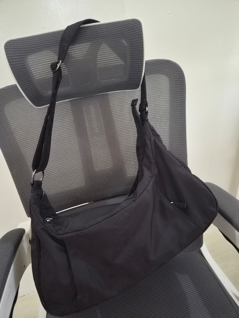 Medela Breastpump Bag (Category: Shoulder Bags) located in Koronadal. Submitted by shineubs (Listing ID 1461611349, Image 1). Description: - Sleek black nylon breastpump bag - extra bag rarely used - Adjustable strap for comfortable wear - Exterior: Front zippered pocket and side flap pocket - Interior: Small zippered pocket - Elegant silver hardware details - Clean and minimalist design, perfect for breastfeeding mom .