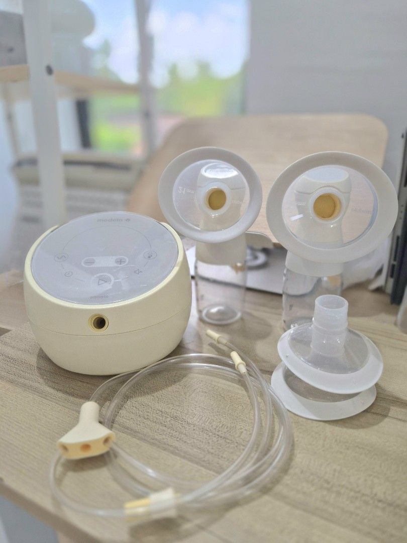 Medela Sonata Electric Breast Pump Set with Issue (Category: Breastfeeding & Bottle Feeding) located in Koronadal. Submitted by shineubs (Listing ID 1461610249, Image 1). Description: - Medela electric breast pump - with issue pm me for the details - Includes motor unit - Two breast shields with bottles - Tubing and connectors included - Ideal for home or on-the-go pumping - Easy to assemble and use.