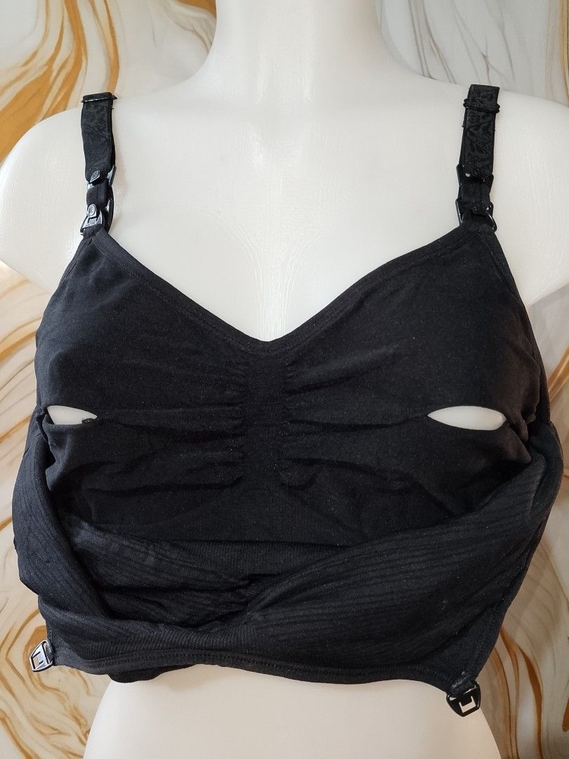MEDIUM TO LARGE cup c to dd Black Nursing Bra with Clasp Release (Category: Undergarments & Loungewear) located in Manila. Submitted by truecrystal-1407 (Listing ID 1461658009, Image 1). Description: - Comfortable black nursing bra - Easy clasp release for convenient feeding - Adjustable straps with a decorative pattern - Soft fabric for all-day comfort - Provides excellent support for new moms.