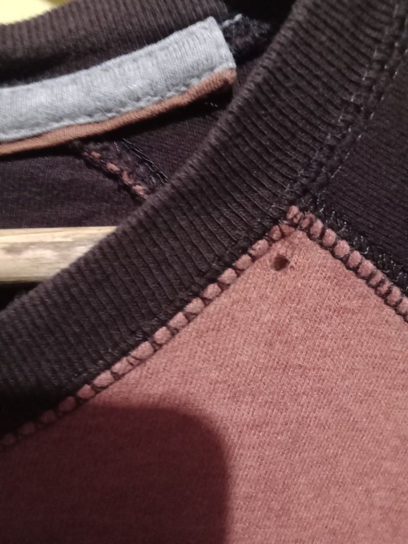 Men's Longsleeve (Category: Tshirts & Polo Shirts ) located in San Fernando. Submitted by _luxielleph (Listing ID 1461797992, Image 3). Description: - Brand: Outdoor Life - Type: Men's Longsleeve - Size: XLT (XXL) - Color: Reddish-pink body with dark brown sleeves (raglan style) - Origin: Made in India - Material: Cotton blend (estimated) - Condition: Used, with minor flaws (small holes visible in images) - Features: Comfortable fit, classic ragl