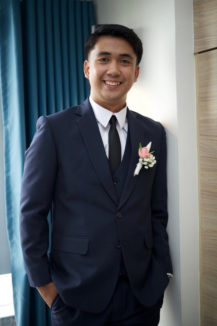 Men's Navy Blue Three-Piece Suit (Category: Coats, Jackets and Outerwear) located in Manila. Submitted by suizaabeg37288 (Listing ID 1461590252, Image 3). Description: - Navy blue three-piece suit: jacket, vest, and trousers. - Classic notched lapel on the jacket. - Button closure for a tailored fit. - Ideal for formal events and business attire. - Sharp, well-tailored look. - Includes a complimentary white dress shirt and black tie..