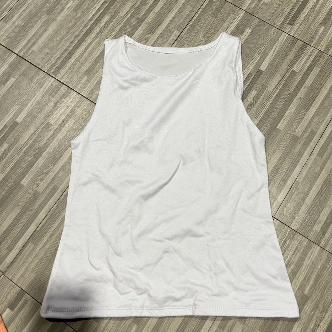 Mera Shirt & White Tank Top Bundle (Category: Shirts) located in Las Pinas. Submitted by veamesia_ (Listing ID 1461564301, Image 3). Description: - Bundle includes: 1 peach short-sleeved t-shirt (Mera) and 1 white sleeveless tank top. - Ideal for everyday wear, casual outings, or layering. ‼️Used once/Preloved ‼️ XS on tag .